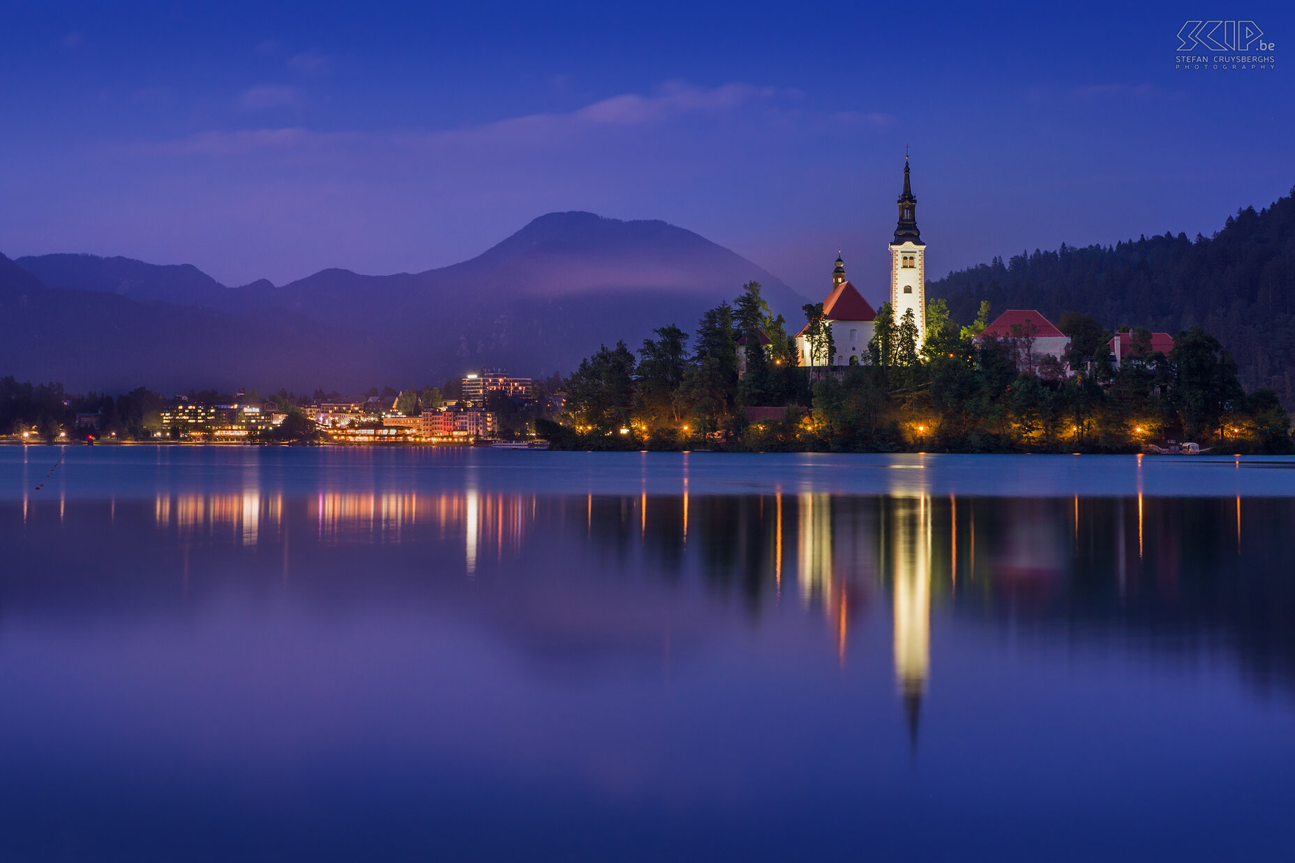 Bled by night The island in Lake Bled with the Church of Mary the Queen Stefan Cruysberghs